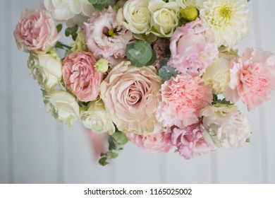 Beautifil bouquet of flowers with roses, eustomas, eucalyptus. 