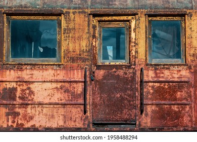 Beautiful Abandoned Rusty Railway Vintage Train Car With Cracked Paint. 