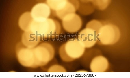A beautiful abstract background featuring soft golden bokeh lights creating a warm and inviting atmosphere.