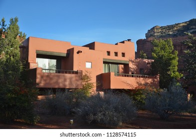 Beautiful Adobe House With Rich Blue Sky Background In Southwest USA Forest Setting