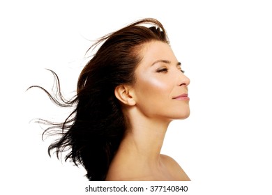 Beautiful Adult Woman With Wind In Hair.