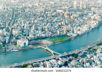 Beautiful aerial cityscape of Sumida River and Tokyo city in the evening time Tokyo, Japan February 7,2020