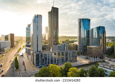 Beautiful aerial evening view of Vilnius business district with scenic sunset illumination. City life in Vilnius, Lithuania.