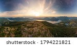 Beautiful Aerial Panoramic View of Canadian Nature Landscape from the top of Tin Hat Mountain during a sunny summer sunset. Taken near Powell River, Sunshine Coast, British Columbia, Canada.