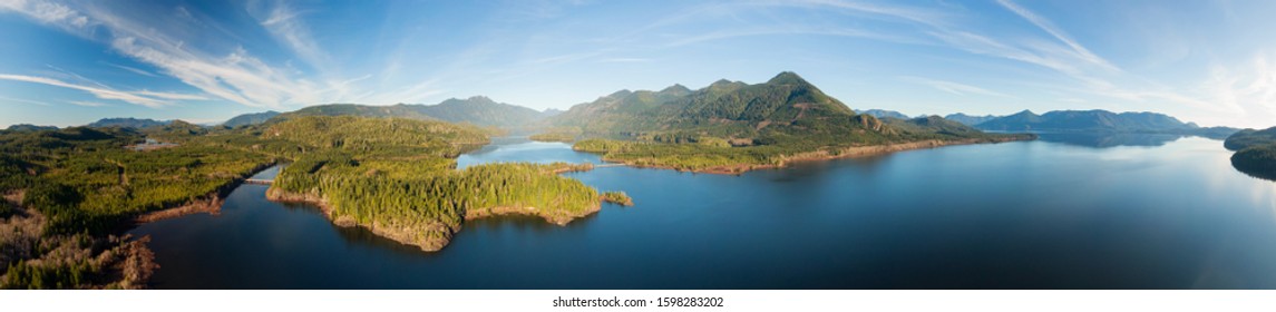 Beautiful Aerial Panoramic View of Kennedy Lake during a vibrant sunny day. Located on the West Coast of Vancouver Island near Tofino and Ucluelet, British Columbia, Canada.