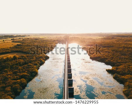 Beautiful aerial photo of the sunset at Moerputten bridge in the  Netherlands 
