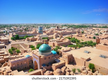 Beautiful aerial view of the 2500-year-old uzbek city Khiva. Ancient Itchan Kala fortress, Mosque, market and houses in Historic Center of Khiva  (UNESCO World Heritage Site), Uzbekistan, Central Asia