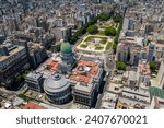 Beautiful aerial view of the Argentina flag waving, the Palace of the Argentine National Congress, in the city of Buenos Aires, Argentina