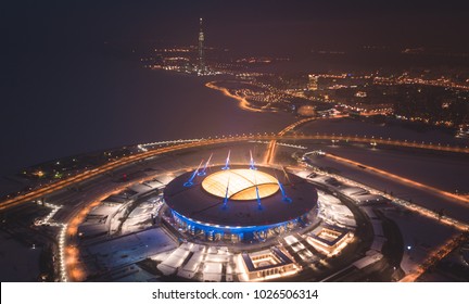 Beautiful aerial view from the bird's eye view of the Gulf of Finland, Saint-Petersburg, Russia, with a stadium, western rapid diameter and cable-stayed bridge, view from quadrocopter drone flight
