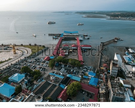 Beautiful aerial view of the city of Tanjungpinang over the sea, Golden Betel Monument as the landmark of Riau Islands, Tanjungpinang, Riau Islands Province, Indonesia, Asia