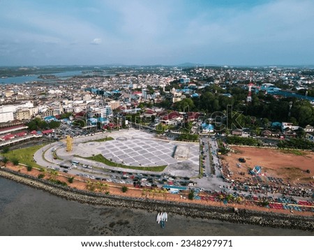 Beautiful aerial view of the city of Tanjungpinang over the sea, Golden Betel Monument as the landmark of Riau Islands, Tanjungpinang, Riau Islands Province, Indonesia, Asia