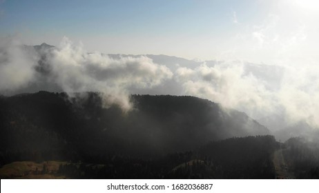 Beautiful aerial view of clouds above the mountains