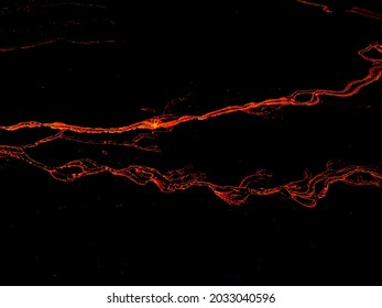Beautiful aerial view at night of the Active Volcano with red Lava in Iceland