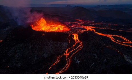 Beautiful aerial view at night of the Active Volcano with red Lava in Iceland - Shutterstock ID 2033040629