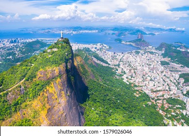 Beautiful aerial view of Rio de Janeiro city with Corcovado and Sugarloaf Mountain in the background from the helicopter ride - Rio de Janeiro, Brazil