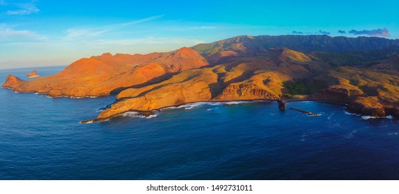 Beautiful Aerial View Of The South West Coast Of The Island Of UA HUKA To The Marquesas Islands By Rising Sun