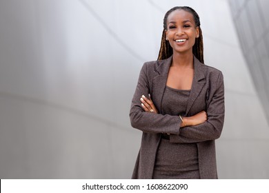 Beautiful African American Business Woman Portrait, Arms Folded, Confident Happy Financial CEO