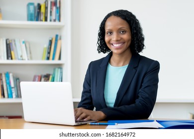 Beautiful African American Businesswoman Working At Computer At Homeoffice To Stay At Home