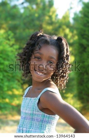 Similar – Cute African American girl smiling in the street with afro hair