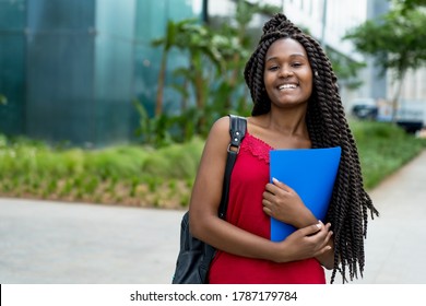 Beautiful African American Female Student With Amazing Hairstyle In Summer 