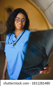 Beautiful African American Healthcare Worker With X-ray, Medical International Concept, Black Doctor Thinking, Modern Student