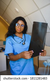 Beautiful African American Healthcare Worker With X-ray, Medical International Concept, Black Doctor Thinking, Modern Student