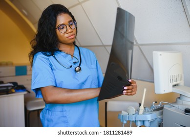 Beautiful African American Healthcare Worker With X-ray, Medical International Concept, Black Doctor Thinking, Modern Student