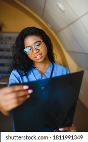 Beautiful African American Healthcare Worker With X-ray, Medical International Concept, Black Doctor Thinking, Modern Student