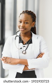 beautiful african american nurse with arms folded