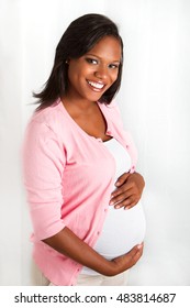 Beautiful African American Pregnant Woman Smiling. 