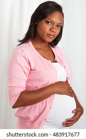 Beautiful African American pregnant woman. 