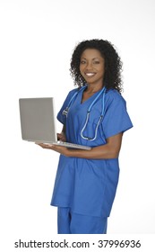 Beautiful African American Woman Doctor Or Nurse Holding A Laptop Computer Isolated On A White Background