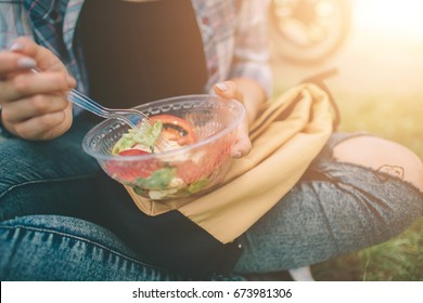 Of Beautiful African American Woman Eating Salad. Lunch, Food On The Street.