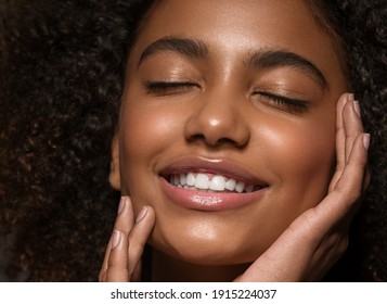 Beautiful african american woman face close up  teeth smile happy positive - Shutterstock ID 1915224037
