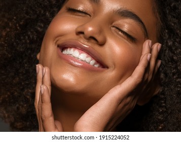 Beautiful african american woman face close up  teeth smile happy positive