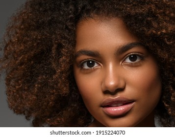Beautiful african american woman face close up smile happy positive