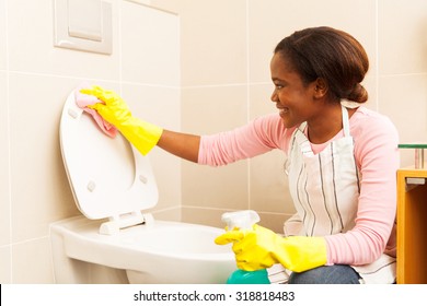 Beautiful African American Woman Wiping Toilet Stock Photo 318818483 ...