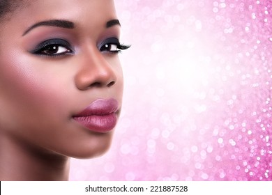 Beautiful African Black Woman Wearing Holiday Makeup With Copy Space. Make Up.