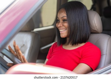 Beautiful African Lady Driving Her Car