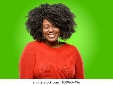 Beautiful African Woman Blinking Eyes With Happy Gesture