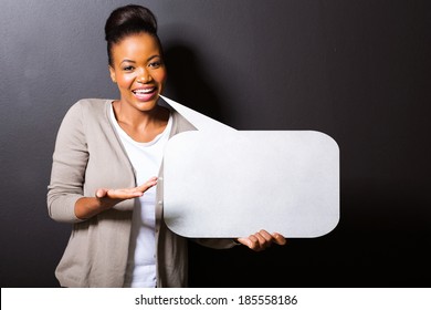 Beautiful African Woman Holding Speech Bubble