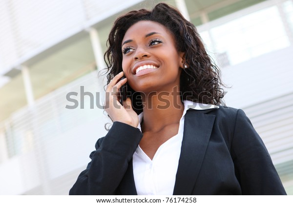 Beautiful African Woman On Cell Phone Stock Photo (Edit Now) 76174258