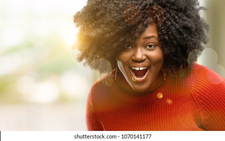 Beautiful African Woman Scared Surprised Cheering Stock Photo ...