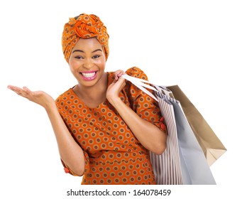 Beautiful African Woman In Traditional Clothes Carrying Shopping Bags On White Background