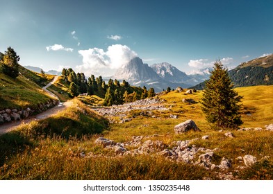 Beautiful Alpine Countryside. Awesome Alpine Landscape With Traditional Huts. Amazing Nature Scenery Of Dolomites Alps. Epic Scene In The Mountains Place Near Seceda Peak. Val Gardena. Dolomiti Alp.