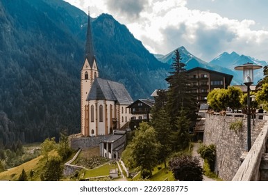 Beautiful alpine summer view with the church of Heiligenblut near the famous Grossglockner High Alpine Road, Salzburg, Kaernten, Austria