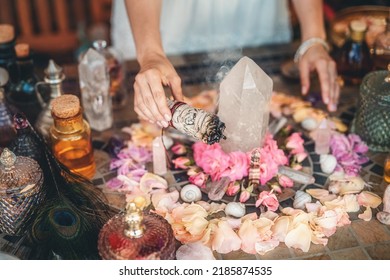 beautiful altar with crystals and rose flowers.