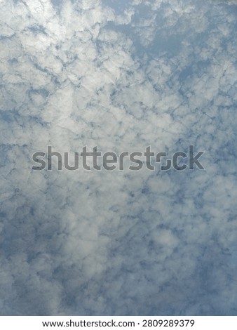 Beautiful altocumulus cloud texture on blue sky background by Johnny Studio Pattaya.
