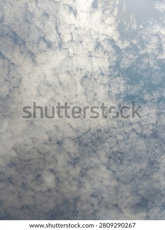 Beautiful altocumulus cloud texture on blue sky background, alternative view by Johnny Studio Pattaya.