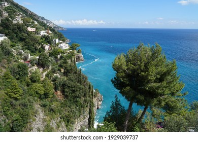 Beautiful Amalfi Coast with turquoise sea, steep cliffs and winding roads, popular summer holiday destination concept, Italy